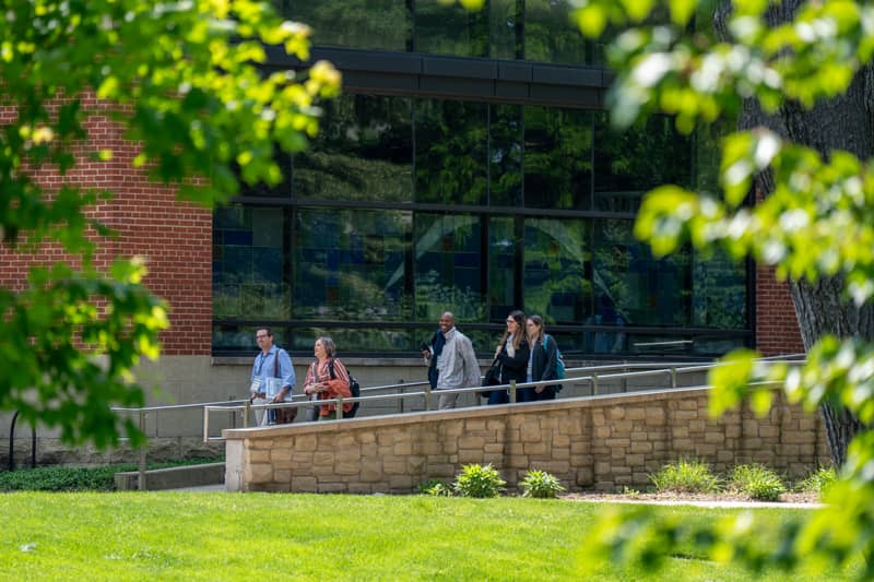 Hope Regional people walking outside of Bultman Student Center