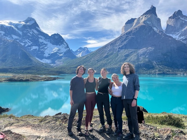 5 students standing in front of a lake in Santiago, Chile