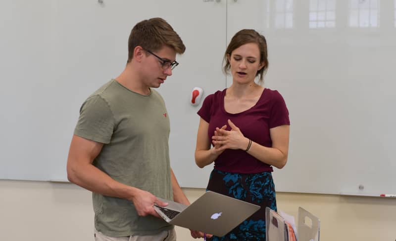 Dr. Kate Finley working with a student for a research project