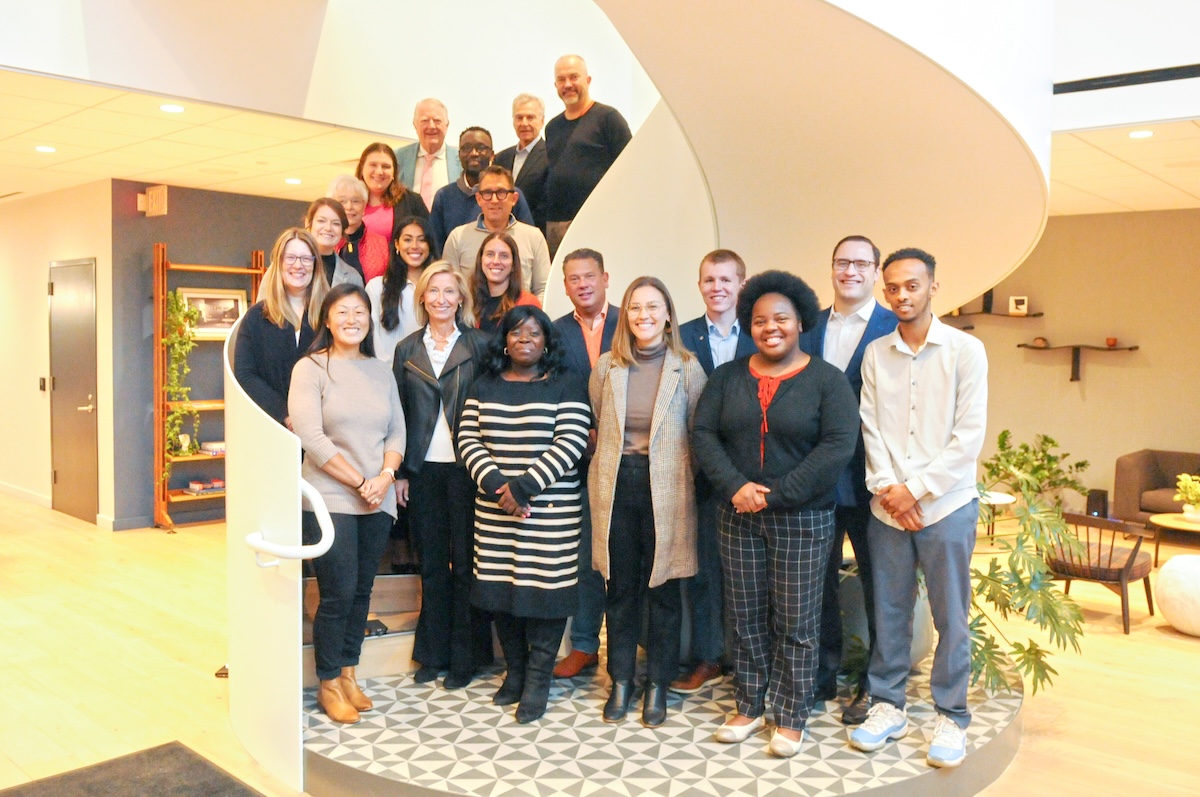 Members of the alumni board, standing in the Haworth Hotel on the campus of Hope College