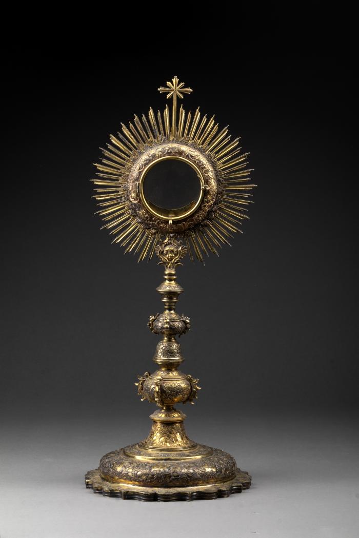 The Monstrance is an object made to hold the Eucharist. It typically includes representations of light beaming out from it.