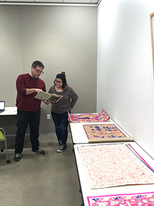 Spring 2020 intern Sylvia Rodriguez working with KAM director and curator Charles Mason