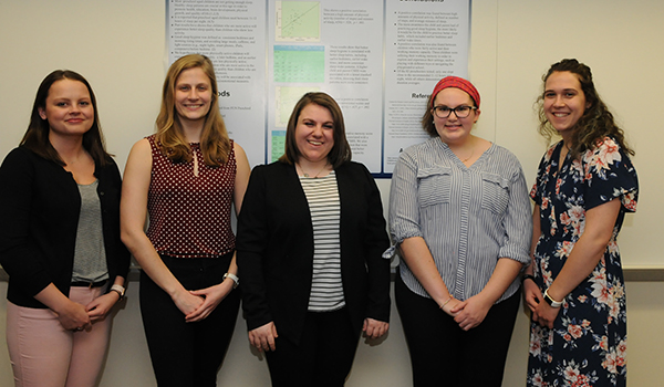 The students from left to right in the group photo are Cameron Everse, Lauren Evert, Rebecca Messnick, Abby Rakus and Micah Manthei