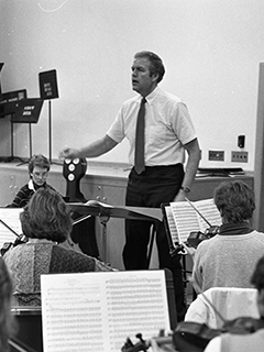 Dr. Robert Ritsema in front of a music class