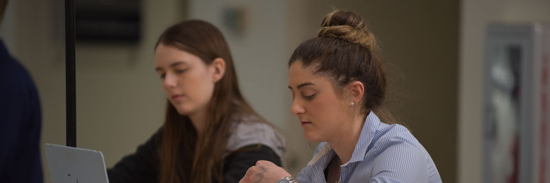 Two female students studying at a table