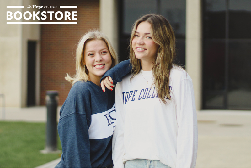 Two female students smiling in Hope sweatshirts